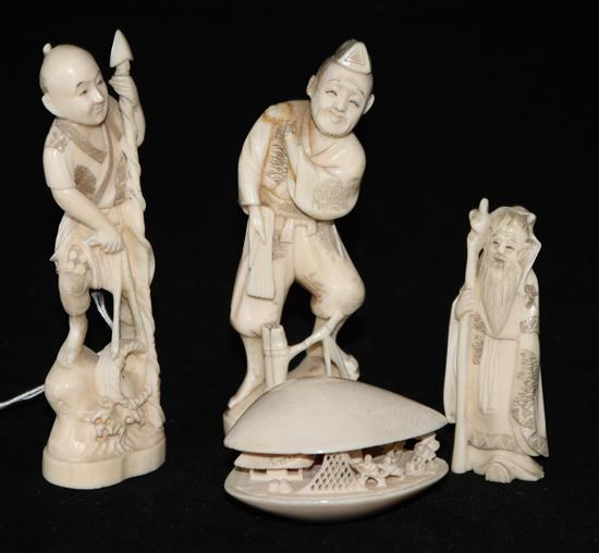 A Japanese ivory model of the Clams Dream and three walrus ivory figures, early 20th century